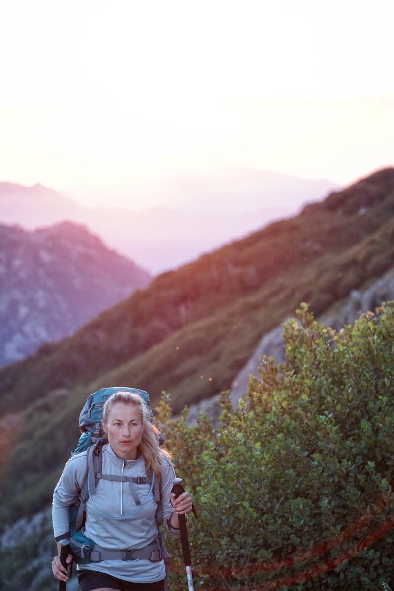 woman hiking, avoid leg and foot pain